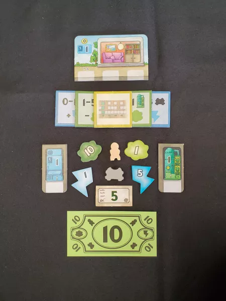 游戏中用于表示资源和设施的精美配件,包括发电机板块、带数值的钱币和能源指示物等。